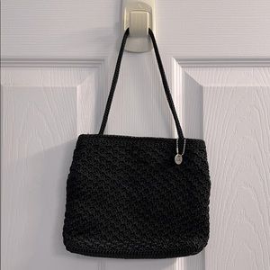 The Sak black woven handbag w/ pop closure & zip pocket